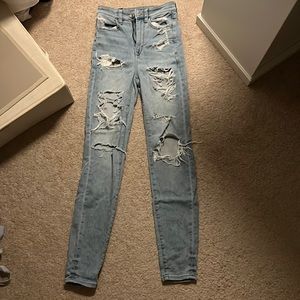 American Eagle next level stretch high rise jegging ripped jeans, light wash